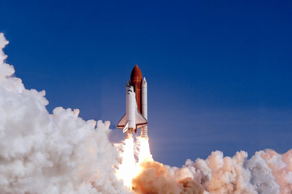 The launch of the space shuttle against the background of the sky and smoke. Elements of this image furnished by NASA. High quality photo