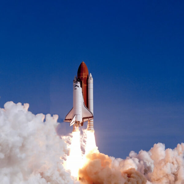 The launch of the space shuttle against the background of the sky and smoke. Elements of this image furnished by NASA. High quality photo